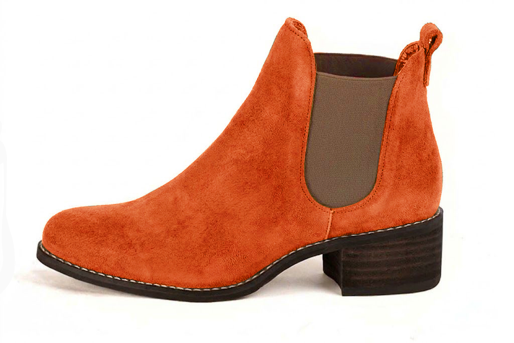 Elevate your look with solid-color leather Chelsea boots featuring sleek elastic side panels and effortless Parisian elegance, in orange leather with round toe and leather sole - Florence KOOIJMAN